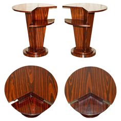 three wooden pedestals with glass tops on each side and an oval table top in the middle