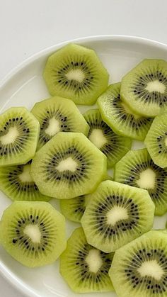 slices of kiwi on a white plate