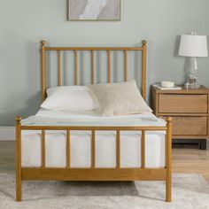 Our solid wood bed frame showcases a rectangular headboard that adds a modern touch to your bedroom. No box spring needed, as the engineered wood slats and center support legs provide ample stability. Legs are included, but the mattress is not. The headboard is non-adjustable, maintaining a sleek and streamlined appearance. Elevate your sleeping space with this contemporary design. Joss & Main Size: Twin | Joss & Main Edward Platform Bed Frame w/ Headboard in Natural | Size Twin Vintage Twin Bed, Natural Wood Twin Bed, Wooden Bed Frame Twin, Solid Wood Twin Bed, Wood Spindle Bed Twin, Solid Wood Twin Bed Frame, Platform Bed Frame With Headboard, Platform Bed Designs, Solid Wood Bed Frame