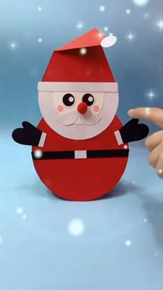 an animated santa clause standing in the snow