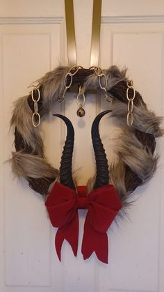 Bitch please I'm a witch 🧹🪄🕯️💎 | With Krampusnacht just a couple weeks away, I wanted to make my own Krampus Wreath. | Facebook Krampus Yard Decor, Creepmas Decorations Diy, Krampusnacht Traditions, Krampus Christmas Decor, Krampus Wreath, Krampus Nutcracker, Diy Krampus