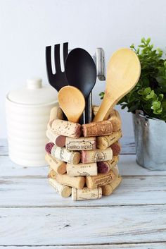 a stack of wine corks with utensils in it