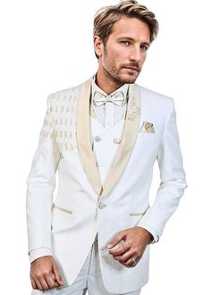 Elevate your style and immerse yourself in the pinnacle of luxury with our handcrafted Off-White Hand-Embroidered Tuxedo Set, an exclusive offering designed specifically for discerning men who possess a deep appreciation for life's finer pleasures. The tuxedo jacket stands as a masterpiece of sartorial artistry, boasting intricate embroidery that pays homage to the exceptional skill of our artisans. Every detail has been meticulously hand-stitched to perfection, reflecting a level of craftsmanship that transcends ordinary attire. The rich Off-White fabric exudes an aura of sophistication and elegance, making it the ideal choice for any formal occasion. The ensemble comprises a classic tuxedo jacket, impeccably tailored pants, a coordinating vest, a refined bow tie, and a crisp white shirt. Designer Notch Lapel Blazer For Wedding, Designer Wedding Suits With Notch Lapel, Tailored Sherwani For Wedding, Fitted White Sherwani For Groom, White Bandhgala For Groom, Luxury Bandhgala For Wedding, Designer Tailored Tuxedo For Groom, Designer Tailored Suit For Wedding, Gold Tuxedo Suit For Groom