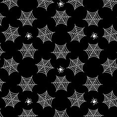 a black and white pattern with spider webs