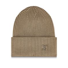 The lv ahead beanie is a versatile ribbed hat with a classic silhouette. This piece features tone-on-tone enamel lv initials on a turned-up cuff. The luxurious accessory is made from pure cashmere for soft warmth and comes in multiple colourways to suit a variety of looks. Jockey Hat, Ribbed Hat, Brown Accessories, Neck Accessories, Knit Hats, Louis Vuitton Official, Head And Neck, Machine Knitting, Luxury Handbags