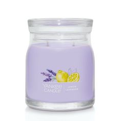 a lavender candle with lemons and lavender