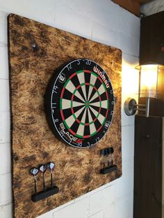 a dart board mounted to the side of a wall