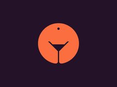 an orange circle with a cocktail glass in it's center on a dark background