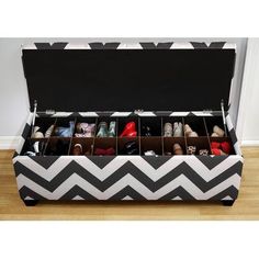 the shoe box is filled with many pairs of shoes