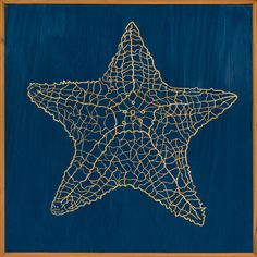 a painting of a gold starfish on blue background with wood frame in the center