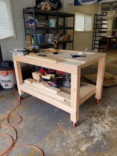 a workbench with tools on it in a garage