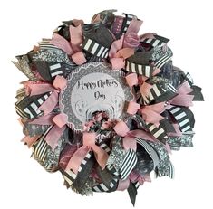 a pink and black wreath with the words happy mother's day written on it