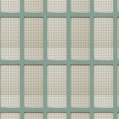 an image of a wall made out of squares and dots in white and green colors