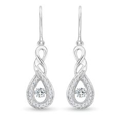 Embodying sublime elegance, these floating diamond earrings feature twisted infinity frames in 14K white gold. They are suspended from fish hooks and give a stunning drop look. Adorned with diamond accents on the curves and a round diamond in the center, these infinity twist drop earrings exude effortless elegance. Diamond Jewelry Earrings, White Diamond Earrings, Earrings With Diamonds, Gold Sign, Fish Hooks, American Wedding, Loop Earrings, Oval Frame, Amethyst Earrings