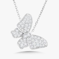 A dainty 18k Gold chain houses a dazzling butterfly that delicately floats on the neck. It’s simple yet sophisticated design allows for everyday wear. Metal: 18k White Gold / 18k Yellow Gold / 18k Rose Gold Round Brilliant Cut Natural Diamonds: Approx. 0.65 ctw G/H Color and VS Clarity Diamonds Length: 16 inches Closure: Lobster Clasp Pendant Measurements: approx. 17mm x 13mm Looking for a different length? Please email us. 18k Gold Chain, Butterfly Necklace, Sophisticated Design, 18k Rose Gold, Round Brilliant, Gold Chain, Custom Jewelry, Gold Chains, Lobster Clasp