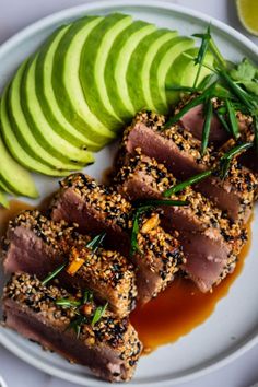 Make restaurant-style seared tuna with a delicious soy dipping sauce. Learn how to perfectly sear ahi tuna with a crunchy sesame seed crust. Cooked rare. #appetizer #dinner #quickandeasy #searedtuna #ahituna #sesametuna Seared Ahi Tuna Recipe, Grilled Tuna Steak, Seared Tuna Recipe, Sesame Seared Tuna, Ahi Tuna Steak Recipe, Tuna Appetizer, Sesame Crusted Tuna, Ahi Tuna Recipe, Seared Tuna Steaks