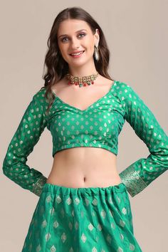 color-green, fabric-jacquard, work-gold woven, brand-name-krupali-savani,occasion-festivewear, occasion-wedding-guest, womenswear,ideal-for-women, lehengas, Product Features: Color: Green Lehenga Fabric: Jacquard Silk Choli Fabric: Jacquard Silk Work: Gold Woven Sleeves: Full Sleeves Neck Type: V Neck Wash Care: Dry Clean Occasion: Festivewear, Wedding Guest Product Type: Lehenga Choli with Dupatta Disclaimer: There will be slight difference in digital to actual image Brocade Sharara With Pallu, Green Anarkali Long Sleeve Choli, Brocade Sharara For Festivals, Green Meenakari Sharara, Banarasi Silk Long Sleeve Blouse Piece For Wedding, Green Formal Traditional Wear For Transitional Season, Festive Banarasi Silk Long Sleeve Choli, Festive Banarasi Silk Choli With Long Sleeves, Bollywood Banarasi Silk Blouse With Meenakari