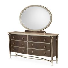 a dresser with a mirror on top of it and a metal frame around the bottom