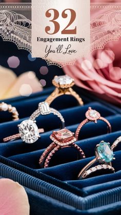 three engagement rings in a blue box with pink flowers behind it and the text, 32 engagement rings you'll love