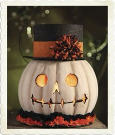 a jack o lantern pumpkin sitting on top of a table