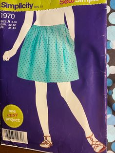 Kit, Pattern, Fabric and Elastic - Sew this simple skirt in an afternoon  Simplicity 1970 - Size 6 to 16 - uncut 1 3/4 yards fabric Brown Background with Blue Floating Bubbles / Polka Dots 1 1/4 yards elastic. Floating Bubbles, Elastic Skirt, Simple Skirt, Sew Simple, Dot Fabric, Polka Dot Fabric, Brown Background, Sewing Kit, Blue Polka Dots