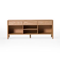 the sideboard is made out of wood and has two open shelves on one side