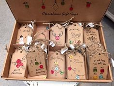 christmas gift tags are in a box on the floor