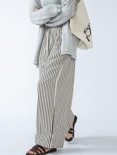 Elevate your ensemble with these high-waisted striped trousers, boasting a loose fit and split-joint accents. Offering both style and comfort, they're a versatile choice for any occasion. Trendy Striped Wide Leg Pants, Casual High-waisted Pants For Day Out, Casual Ankle-length Pants For Day Out, Casual Ankle-length Harem Pants For Day Out, Non-stretch Cotton Bottoms For Day Out, Casual Trousers For Day Out, Baggy Wide Leg Bottoms For Day Out, Trendy Striped Wide-leg Pants, Baggy Trousers For Day Out