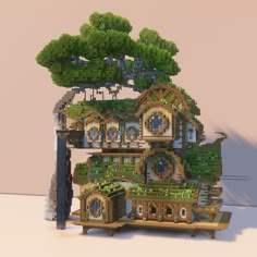 a house made out of legos with trees on the roof and bushes growing from it