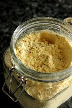 a glass jar filled with food sitting on top of a counter