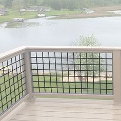 an empty deck overlooking a large body of water