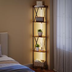 a bedroom with a bed, nightstand and shelves on the wall that have plants in them