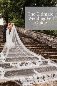 a bride and groom kissing on the steps with text overlay that reads, the ultimate wedding veil guide