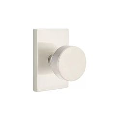 an image of a white knob on a wall