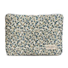 a blue and white floral print cosmetic bag