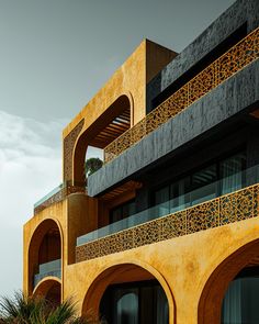 an orange building with two balconies on the second floor