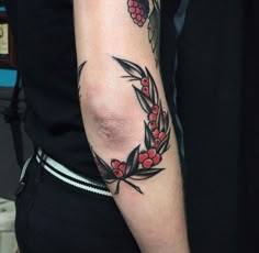 a person with a tattoo on their arm