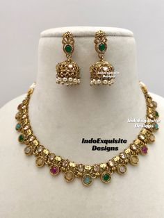 Antique Polki multi color Necklace Set comes with Jhumki earrings/ Indian Jewelry/ High Quality Kundan and Polki Jewelry/ Bollywood Jewelry/Wedding Jewelry All items are shipped from Brampton, Ontario, Canada. If you need your item by a certain day, please reach out to us for express delivery option before you buy so that we can update the shipping for you. We kindly request to consider minor variations in colors, shades, textures as pictures displayed may slightly vary from the actual product due to digital image limitations. Please expect the possibility of some minor imperfections when buying handmade jewelry. Please contact us for any questions you might have. Thank you and Happy shopping 😊 Multicolor Temple Necklace For Navratri, Multicolor Temple Jewelry Necklace, Multicolor Temple Necklace With Tilla For Navratri, Multicolor Chandbali Temple Necklace For Navratri, Multicolor Temple Necklace With Tilla For Festive Occasions, Bollywood Style Multicolor Temple Necklace For Navratri, Festive Multicolor Temple Necklace With Stone Work, Multicolor Bridal Necklace With Tilla For Diwali, Multicolor Temple Necklace For Festivals