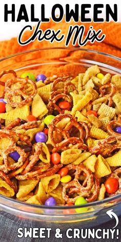 halloween chex mix in a glass bowl