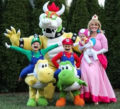 the family is dressed up as mario and luigi