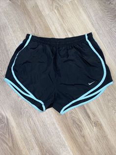 Shorts Women Size Small Nike Running Black ~ Teal. Condition is "Pre-owned". Shipped with USPS First Class. Black Sports Shorts, Cheap Nike Black Athletic Shorts, Blue Nike Athletic Shorts, Nike Blue Athletic Running Shorts, Nike Black Bottoms With Built-in Shorts, Nike Black Athletic Shorts With Built-in Shorts, Outfit Outer, Teal Nikes, Turquoise Shorts