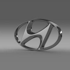 the logo for an automobile company is shown in this 3d rendering image, it appears to be made out of metal