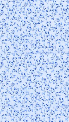 a blue and white background with small flowers