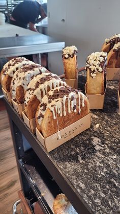 several different types of pastries on a counter