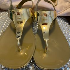 Michael Kors Women’s Size 7m Gold Slingback Flip Flops. Brand New Chic Gold Flat Slingback Sandals, Gold Sandals With Adjustable Strap For Spring, Gold Jelly Sandals With Round Toe For Spring, Gold Slingback Sandals For Summer, Gold Flat Slingback Sandals For Spring, Gold T-strap Sandals With Removable Insole, Gold Open Toe Jelly Sandals For Vacation, Gold Closed Toe Slingback Sandals, Gold Closed Toe Slingback Sandals With Removable Insole