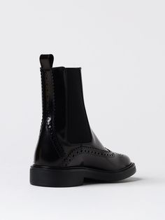 Flat Ankle Boots TOD'S Woman color Black Fall Ankle-high Boots With Brogue Detailing, Brogue Detailing Flat Heel Boots For Fall, Fall Brogue Detailing Flat Heel Boots, Flat Heel Brogue Boots For Fall, Black High-top Brogue Boots, Black Ankle Boots With Brogue Detailing, Black High Ankle Chelsea Boots With Leather Sole, Black Heeled Boots With Rubber Sole For Work, Black Brogue Detailed Boots For Fall