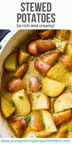 a pot filled with potatoes and topped with parsley