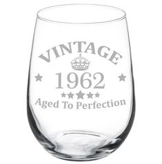 an old fashioned glass with the words vintage aged to perfection on it's side