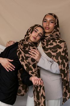 Abstract crescent moons dance across a twilight sky in this celestial hijab. In the perfect chocolate and mocha tones, with gold foil details, you’ll be addicted. Modal Hijab Style, Vela Scarves, Blue Hijab Outfit, Pattern Hijab, Grey Hijab, Elegant Hijab, Modal Hijab, Blue Hijab, Hijab Ideas