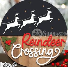 a wooden sign that says reindeer crossing with santa's sleigh